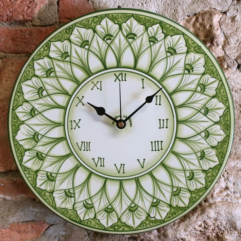 orologio verde da parete in ceramica dipinto a mano in toscana, hand painted green rounded clock in ceramic