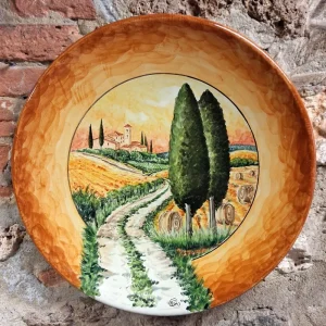 piatto ceramica artistica dipinto a mano terra di siena con paesaggio Toscana, ceramic plate orange color with handpainted tuscany landscape