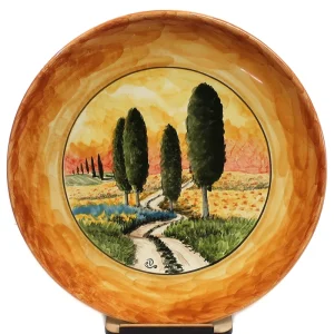 piatto in ceramica arancio terra di siena con paesaggio fatto a mano in toscana, plate in ceramic orange color handmade in tuscany